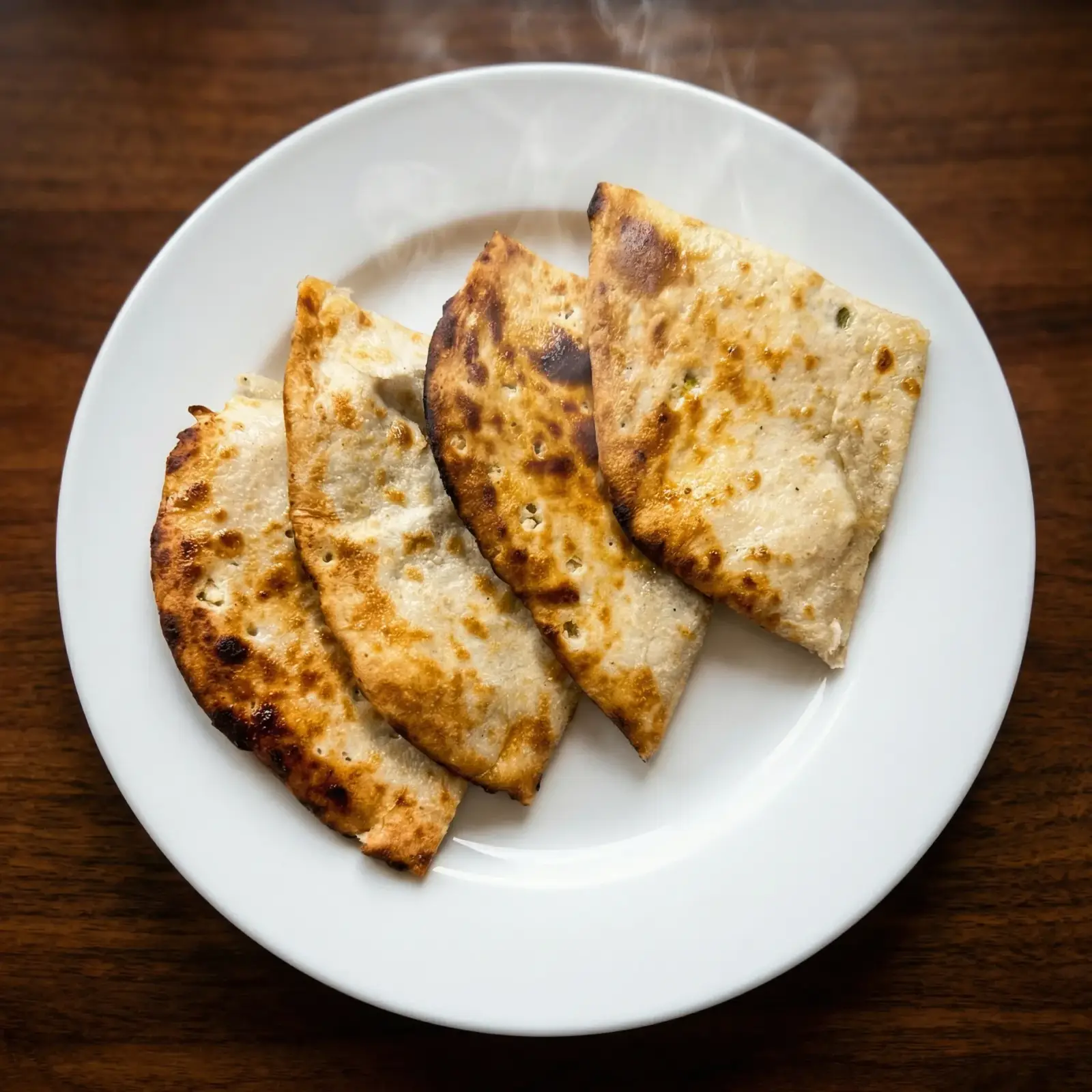 Fresh Naan and Paranthas at Chandigarh Curry House Calgary - traditional Indian breads